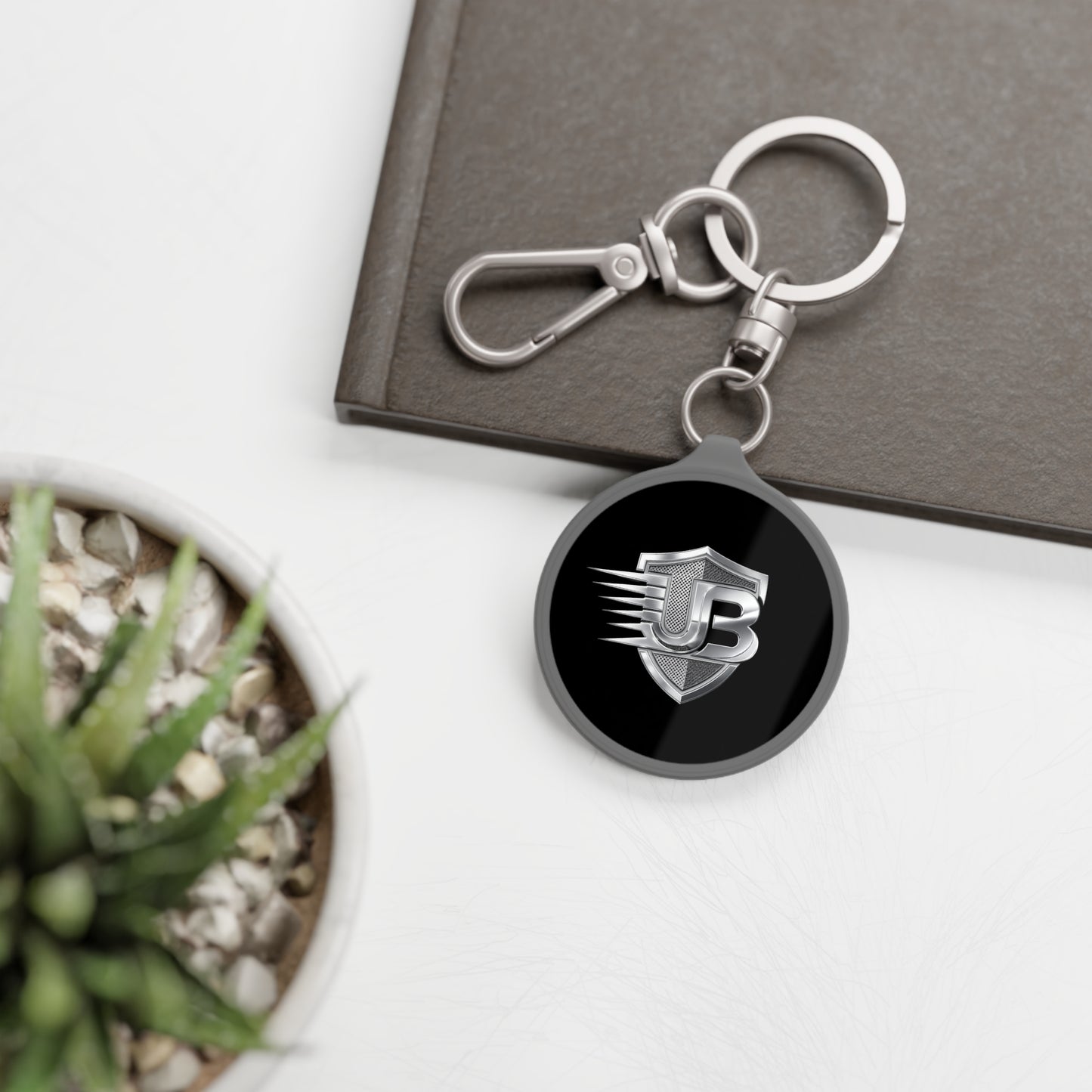 Shielded JB Logo Keyring Tag — Metal Keychain with Emblem