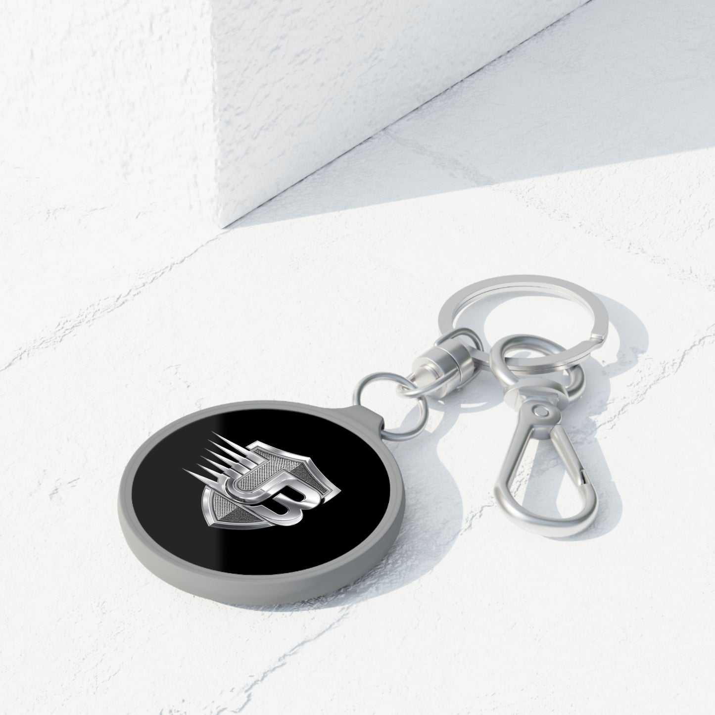 Shielded JB Logo Keyring Tag — Metal Keychain with Emblem